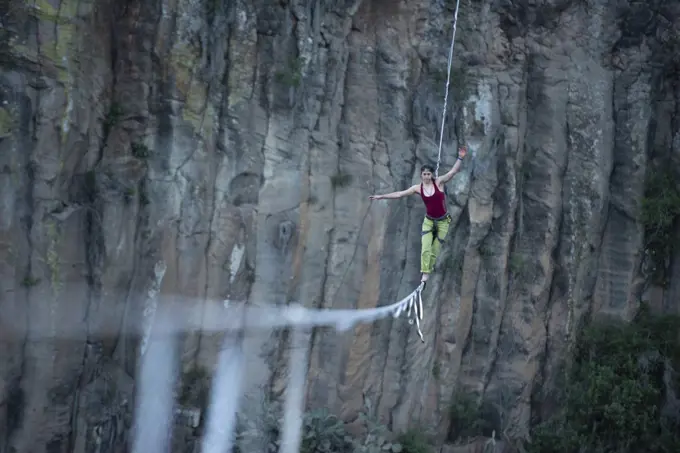 One girl balancing on a highline at "El Gato" canyon