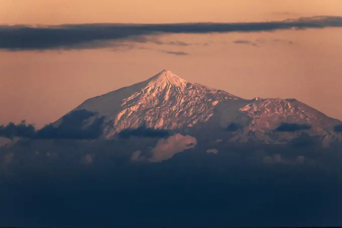 Snowcapped Mountain during sunset a winter day