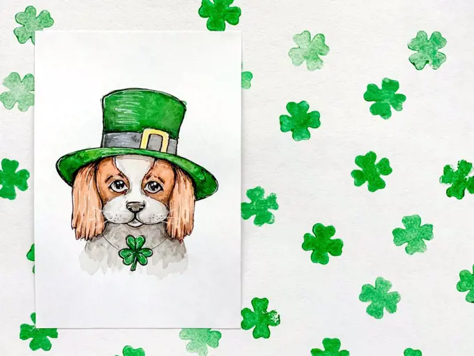 Saint Patricks Day watercolor  sketch: puppy in Irish cap, shamrock