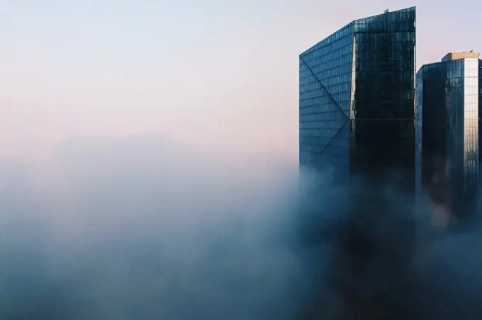 Dubai skyline with glass skyscrapers in fog