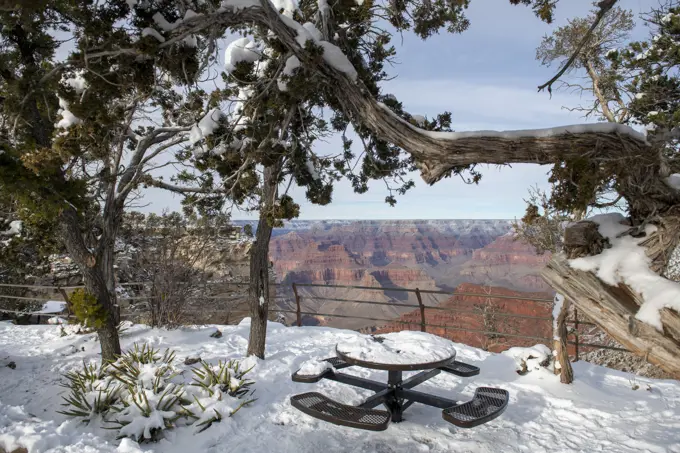 Snowy picnic table on Grand Canyon south rim scenic drive