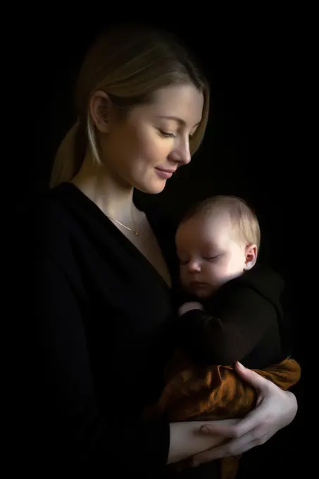 Studio shot of young mom with her little baby. Generative AI