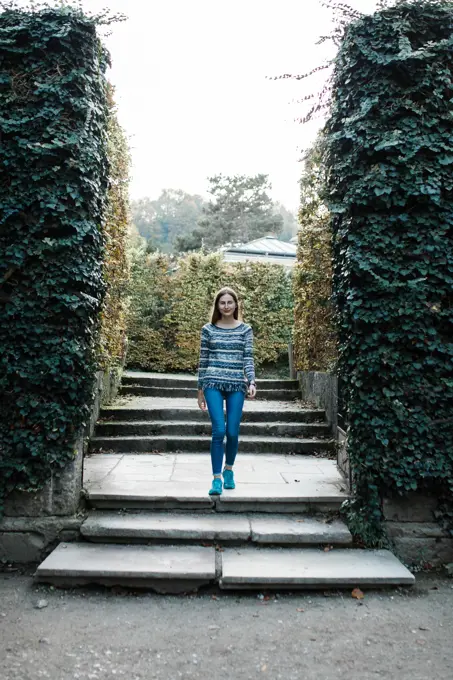 young female tourist walks the streets of Salzburg in Austria