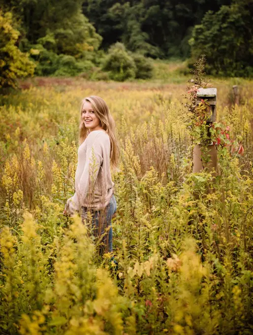 young woman in a field