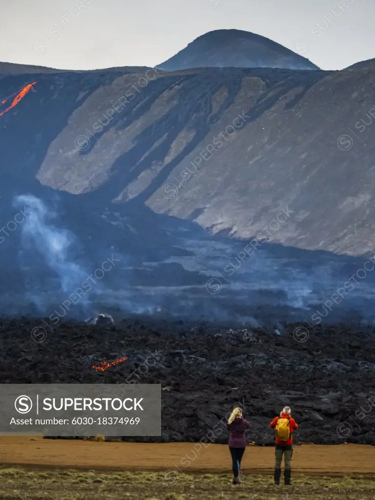 Local Icelanders visiting lava flows from Fagradalsfjall Volcano, Iceland