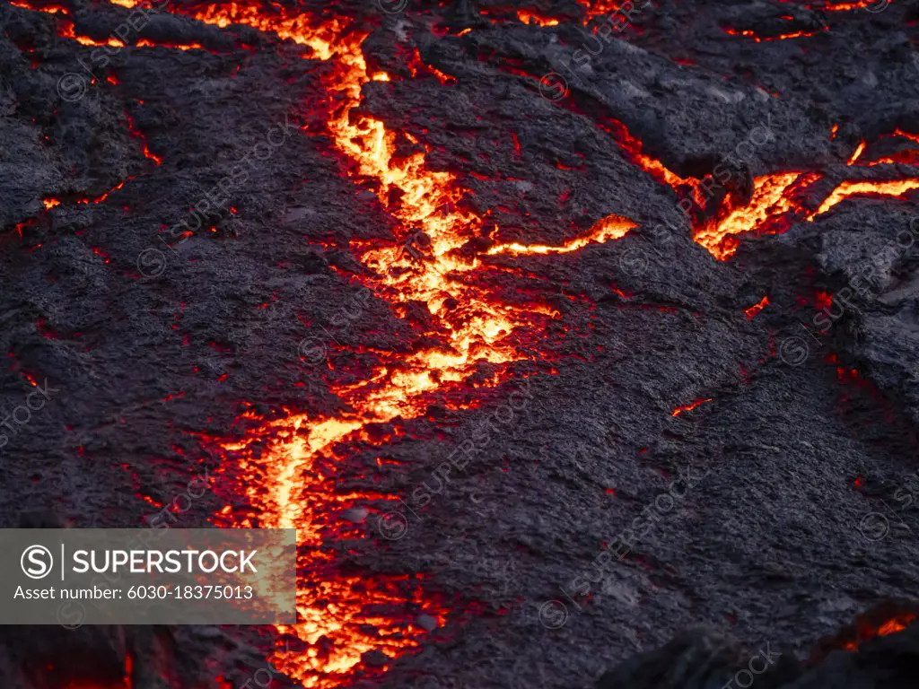 Cracks in lava flow and glowing magma, Fagradalsfjall Volcano, Iceland