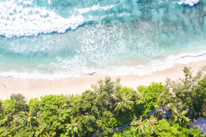 Takamaka beach nature vacation paradise ocean copyspace copy space drone view aerial photo in Mahe on the Seychelles.