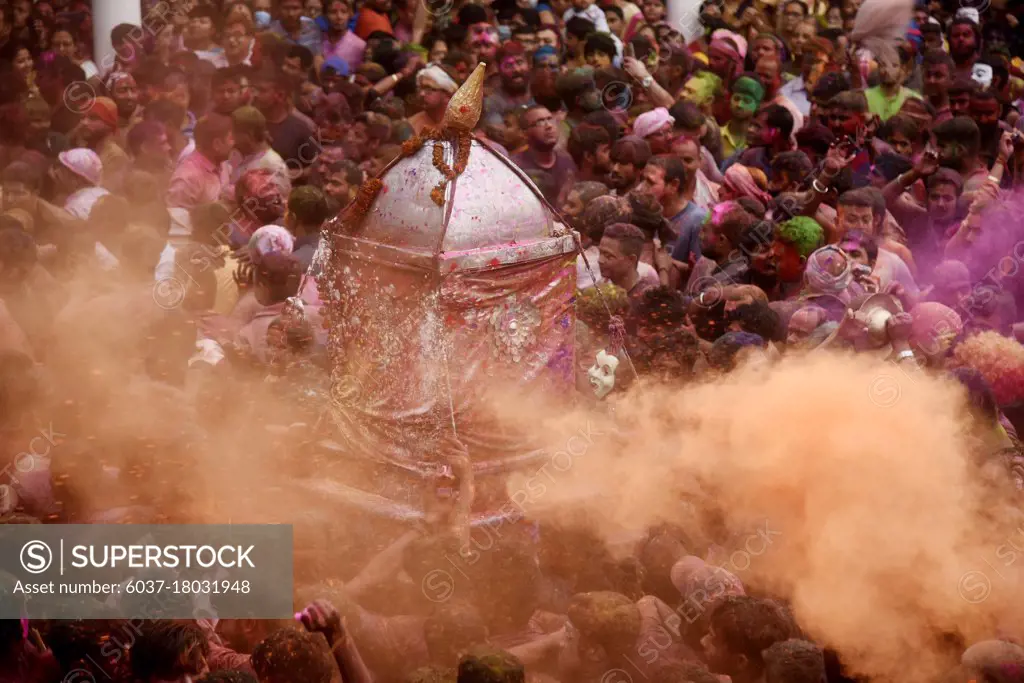 People celebrating holi at Barpeta Satra Namghar, amid COVID-19 coronavirus pandemic, in Barpeta, Assam, India on Monday, 29 March 2021. Barpeta Satra is a well-known sattra situated at Barpeta in the Indian state of Assam. It was established by vaishnavite saint Madhabdeva.