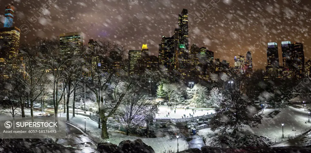 Skating in New York at night during snow