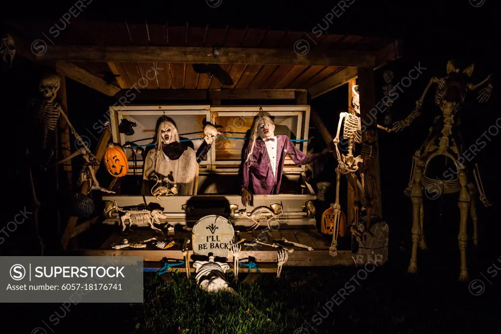 Halloween decorations outside at night setup