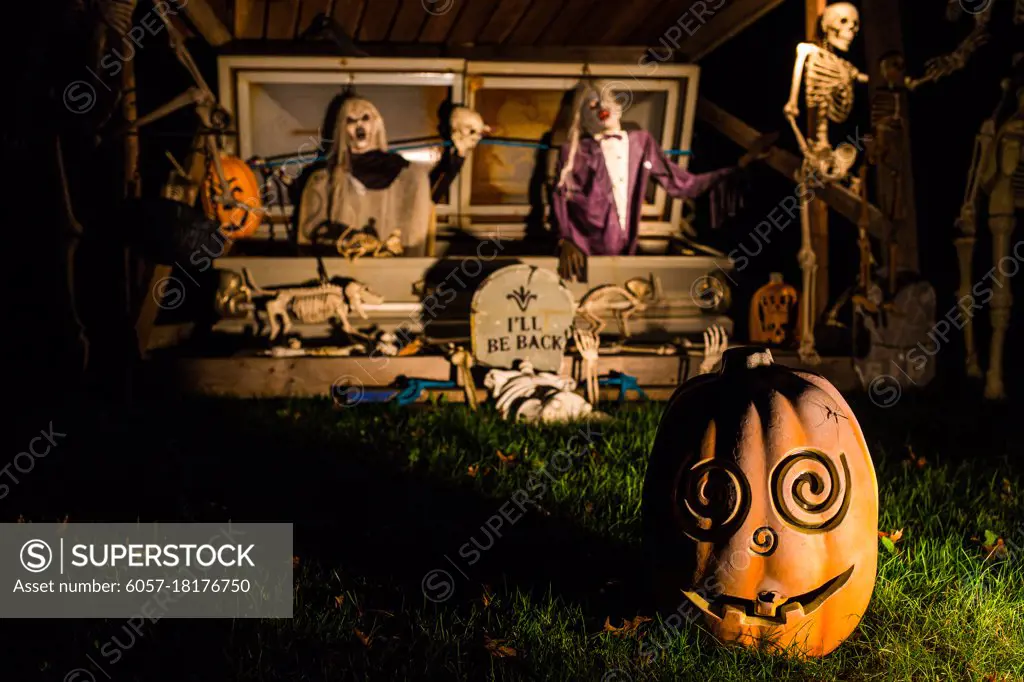 Halloween decorations outside at night setup