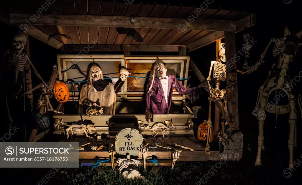 Halloween decorations outside at night setup