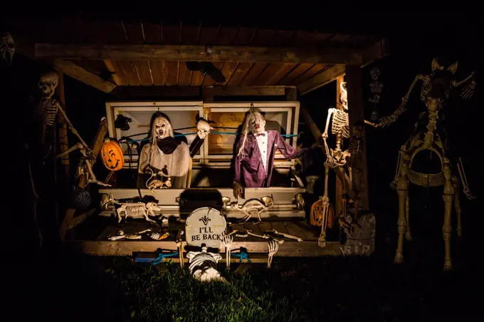 Halloween decorations outside at night setup