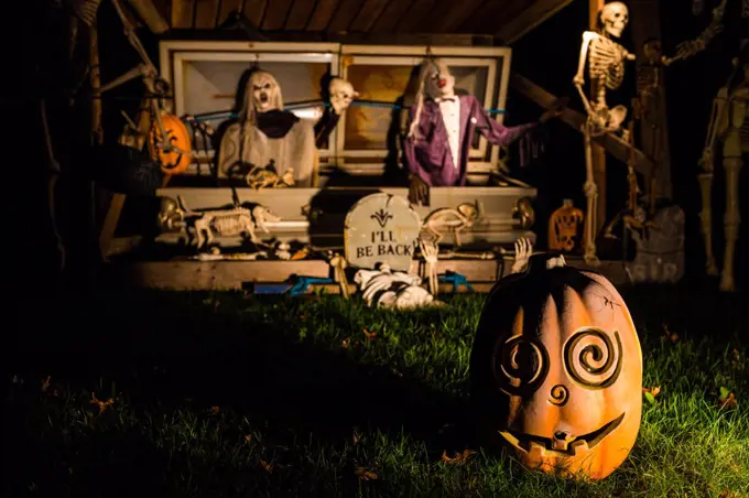 Halloween decorations outside at night setup