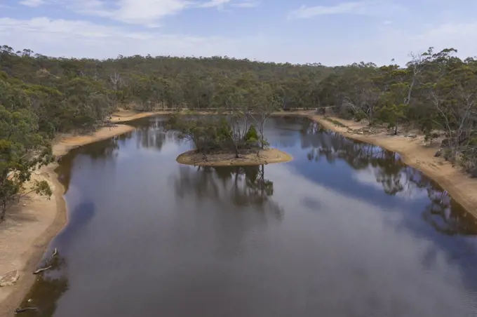 Aerial view of a drought affected water reservoir in regional Australia