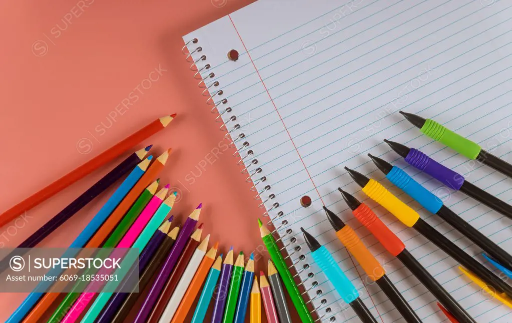 Back to school concept school office supplies of papers, pencils, markers and notepads with copy space