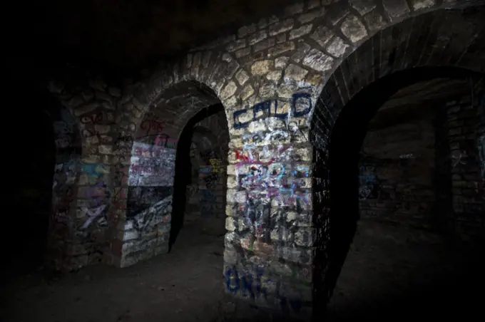 In the bowels of Paris. Exploration in the banned catacombs of Paris. Dans les entrailles de Paris. Exploration dans les catacombes interdites de Paris.