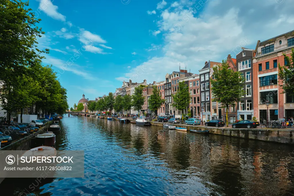 Singel canal in Amsterdam with old houses. Amsterdam, Netherlands