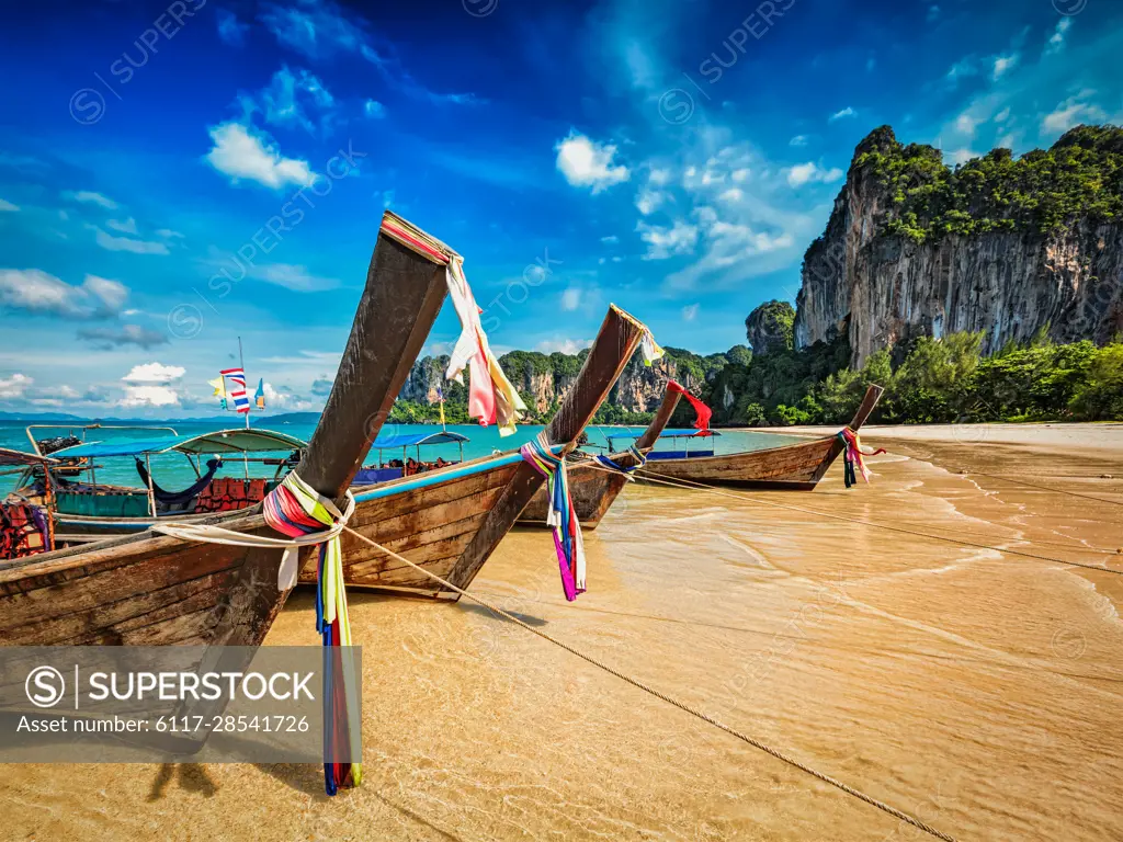 Long tail boats on tropical beach (Railay beach) in Thailand