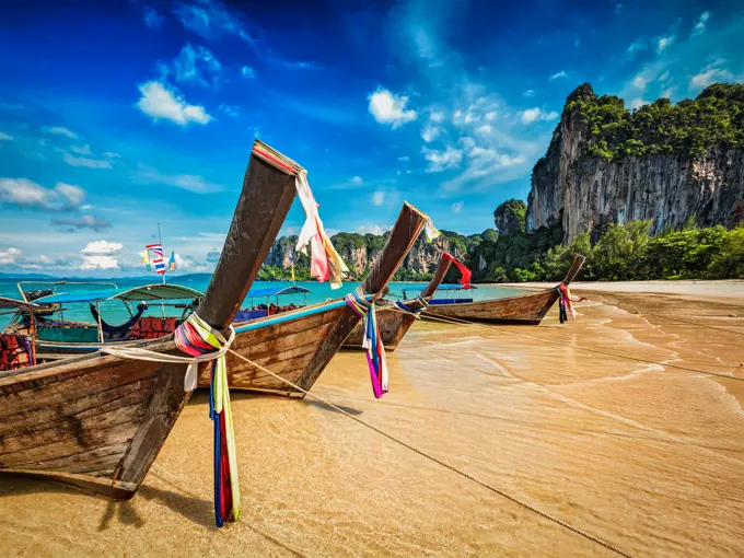 Long tail boats on tropical beach (Railay beach) in Thailand