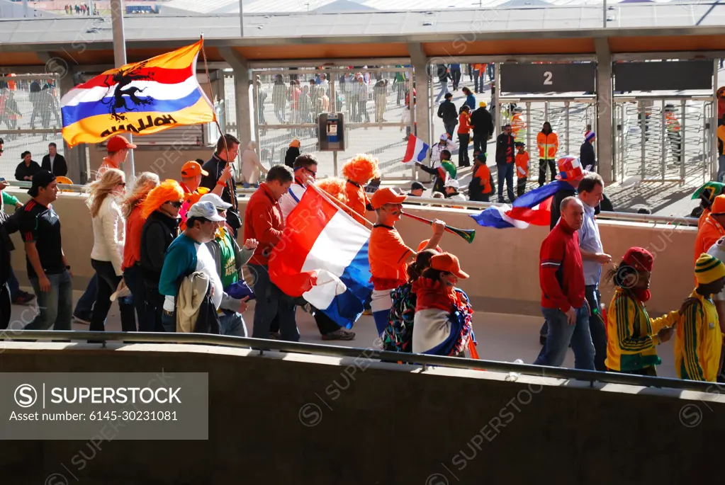 Dutch fans enter Soccer City Stadium in Johannesburg, South Africa, to watch the Netherlands play Denmark on June 14, 2010.