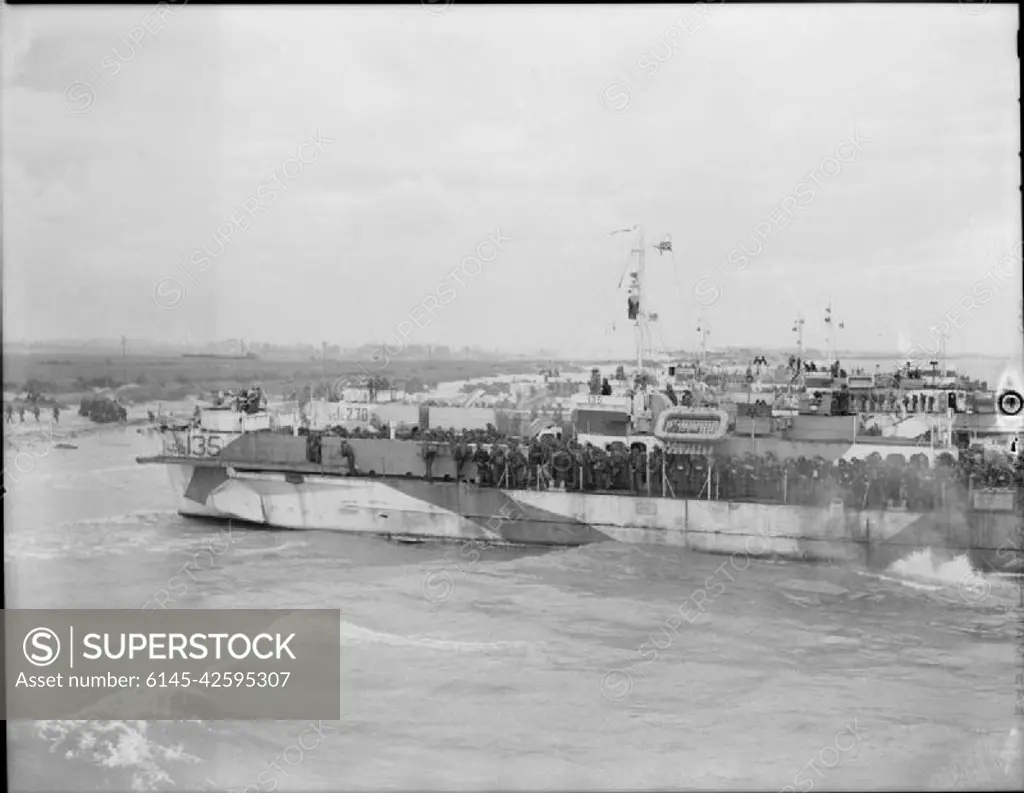 The Royal Navy during the Second World War- Operation Overlord (the Normandy Landings)- D-day 6 June 1944 Landing Craft Infantry (LCI 135, LCI 270 and LCI 262) about to disembark troops of the 9th Canadian Infantry Brigade onto 'Nan White' Beach, JUNO Area, at Bernieres-sur-Mer on D Day.