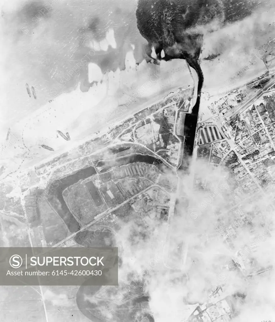 D-day - Allied Forces during the Invasion of Normandy 6 June 1944 Vertical aerial photograph of the landings on Mike beach, Juno area, at Courselles-sur-Mer, 6 June 1944.