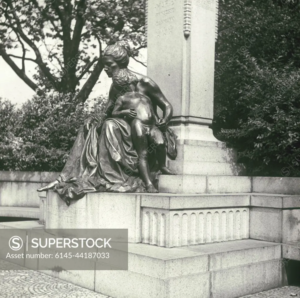 Tomb with grievable woman and naked boy - SuperStock