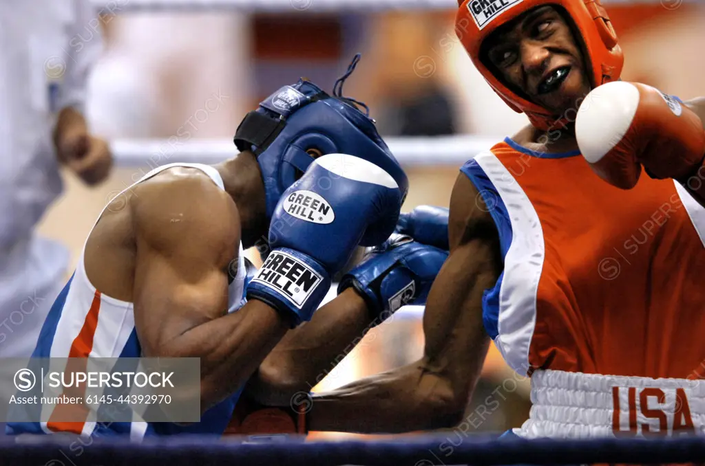 U.S. Army Spc. Hardwick Zacaeus, right, boxes Joan Nilusmas, from France, during the Counseil International du Sport Militarie's Military World Games in Hyderabad, India, Oct. 16, 2007. The games is the largest international, military, Olympic-style event in the world, with 103 countries and more than 5,000 athletes scheduled to compete.