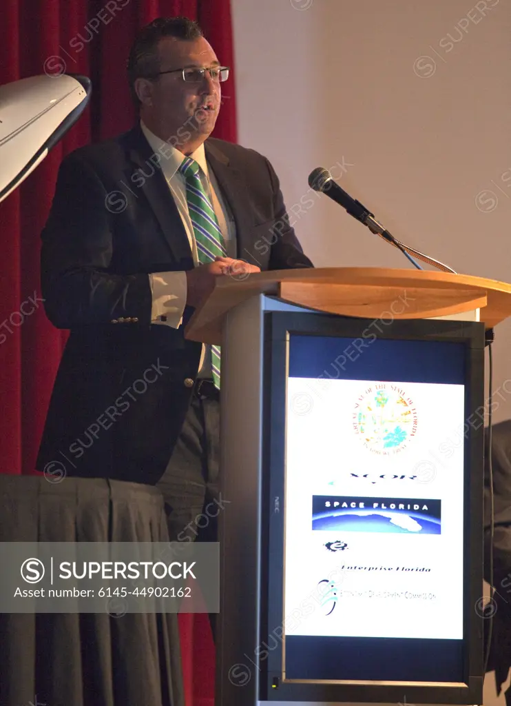 CAPE CANAVERAL, Fla. - At NASA's Kennedy Space Center in Florida, Todd Lindner, senior manager of Aviation Planning and Spaceport Development for the Jacksonville Aviation Authority, addresses guests at a presentation during which XCOR Aerospace announced plans to open a manufacturing operation in Brevard.The company's suborbital Lynx Mark II spacecraft possibly will take off and land at Kennedy's shuttle landing facility. XCOR Aerospace is a small, privately held California corporation with focus on the research, development, project management and production of reusable launch vehicles, rocket engines and rocket propulsion systems. XCOR will focus on space tourism, experimental flights and launching satellites.