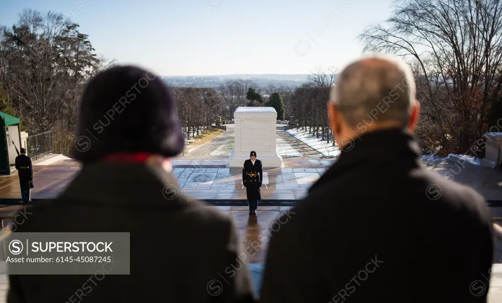 NASA Administrator Charles Bolden and his wife Alexis watch as Tomb guards with The Old Guard, the 3rd U.S. Infantry Regiment, perform a changing of the guard prior to a wreath-laying ceremony as part of NASA's Day of Remembrance, Wednesday, Jan. 28, 2015, at Arlington National Cemetery in Arlington, Va.  The wreaths were laid in memory of those men and women who lost their lives in the quest for space exploration.