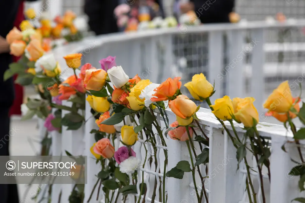 Flowers are placed near the Space Mirror Memorial at the Kennedy Space Center Visitor Complex. The names of fallen astronauts from Apollo 1, Challenger and Columbia, as well as the astronauts who perished in training and commercial airplane accidents are emblazoned on the monument. During the annual Day of Remembrance, spaceport employees and guests join others throughout NASA honoring the contributions of astronauts who have perished in the conquest of space.