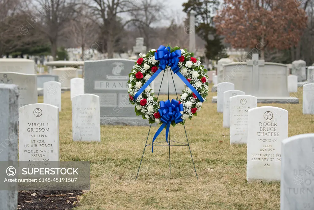 The grave markers of Virgil "Gus" Grissom and Roger Chaffee, from Apollo 1, are seen before a wreath laying ceremony that was part of NASA's Day of Remembrance, Thursday, Feb. 7, 2019, at Arlington National Cemetery in Arlington, Va.  Wreaths were laid in memory of those men and women who lost their lives in the quest for space exploration.