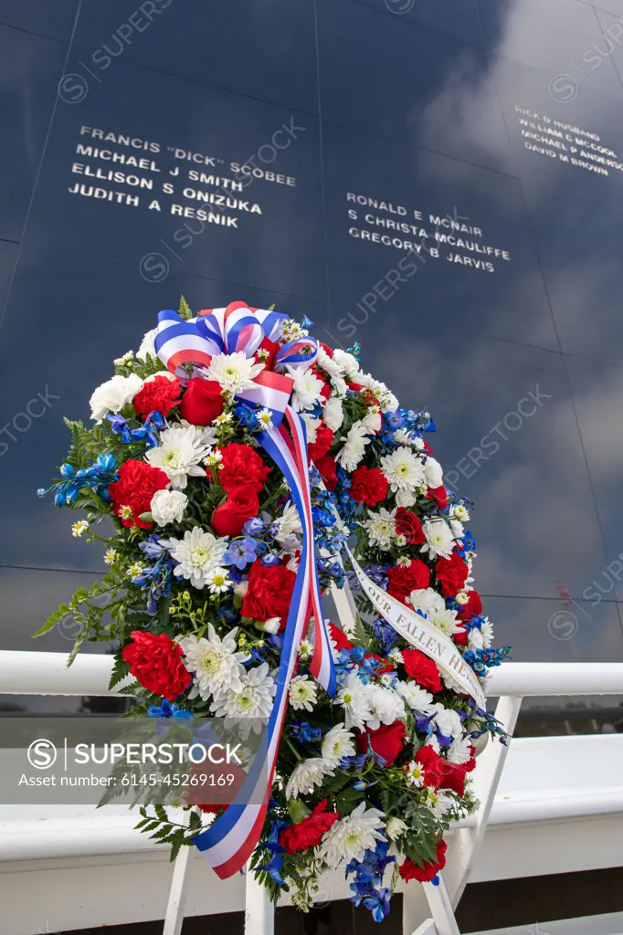 A wreath is displayed during the NASA Day of Remembrance ceremony at the Space Mirror Memorial in the Kennedy Space Center Visitor Complex on Jan. 30, 2020. The crews of Apollo 1 and space shuttles Challenger and Columbia, as well as other fallen astronauts who lost their lives in the name of space exploration and discovery, were honored at the annual event.