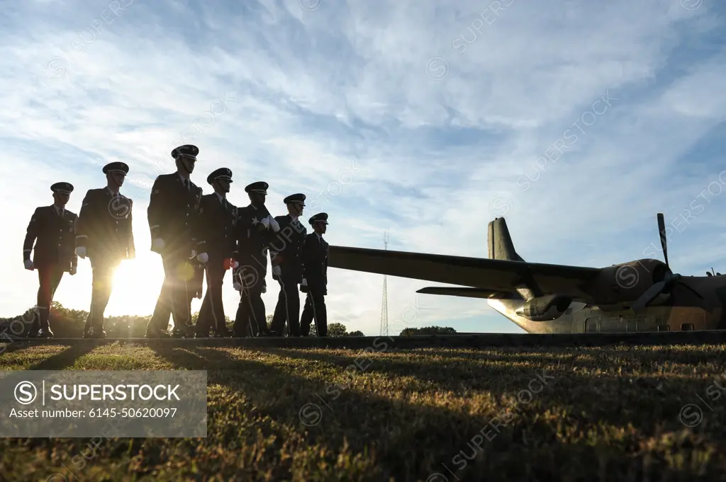 Ceremonial guardsmen retire the colors during a Veterans Day retreat ceremony Nov. 10, 2014, at Little Rock Air Force Base, Ark. Veterans Day is observed Nov. 11 and was originally known as Armistice Day or Remembrance Day.