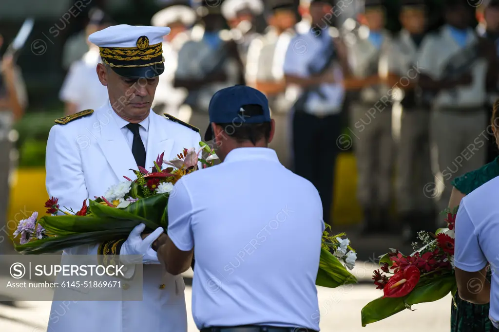 Participants pass ceremonial bouquets during a Victory in Europe Day” World War II remembrance ceremony outside the Haut-commissariat de la République Tahiti, French Polynesia, May 8, 2022. The ceremony kicks off exercise Marara 22 and highlights the U.S. commitment to our Indo-Pacific allies and partners, and reinforces incentives for multilateral cooperation.