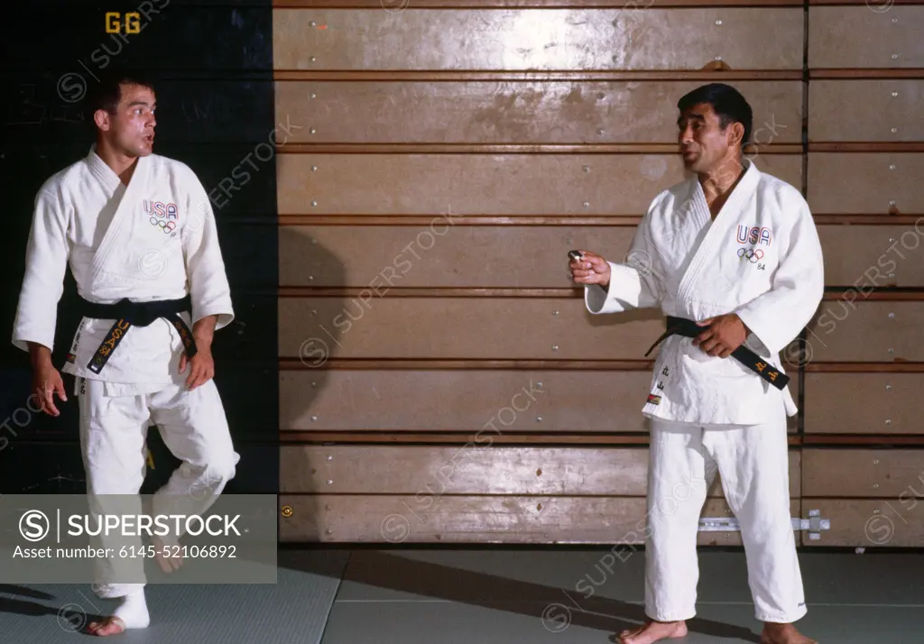 Army 2nd Lieutenant Craig Agena from Fort Carson, Colorado, and another member of the judo team, prepare for competition at the 1984 Summer Olympics. Base: Los Angeles State: California (CA) Country: United States Of America (USA)