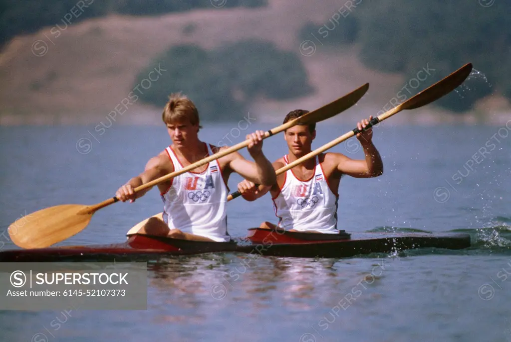 Army National Guard Private First Class Daniel W. Schnurrenberger, right, from Newport Beach, California, participates in the kayak competition at the 1984 Summer Olympics. Base: Lake Casitas State: California (CA) Country: United States Of America (USA)