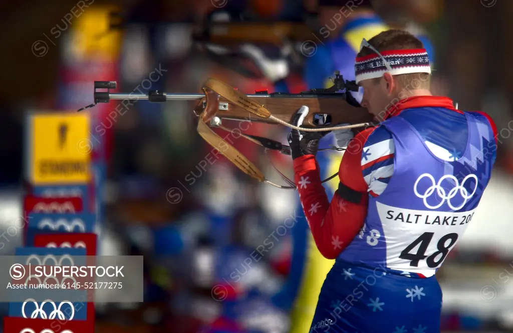 World Class Athlete SPECIALIST (SPC) Jeremy Teela, USA, takes aim with his .22 caliber, bolt-action rifle at the range during the men's 20km individual Biathlon event at Soldier hollow in Midway, Utah during the 2002 WINTER OLYMPIC GAMES. SPC Teela finished with a personal best, two missed targets out of five, which led him to a 14th place finish, the best in American history for the Olympic Games. Subject Operation/Series: 2002 WINTER OLYMPIC GAMES Base: Midway State: Utah (UT) Country: United States Of America (USA)