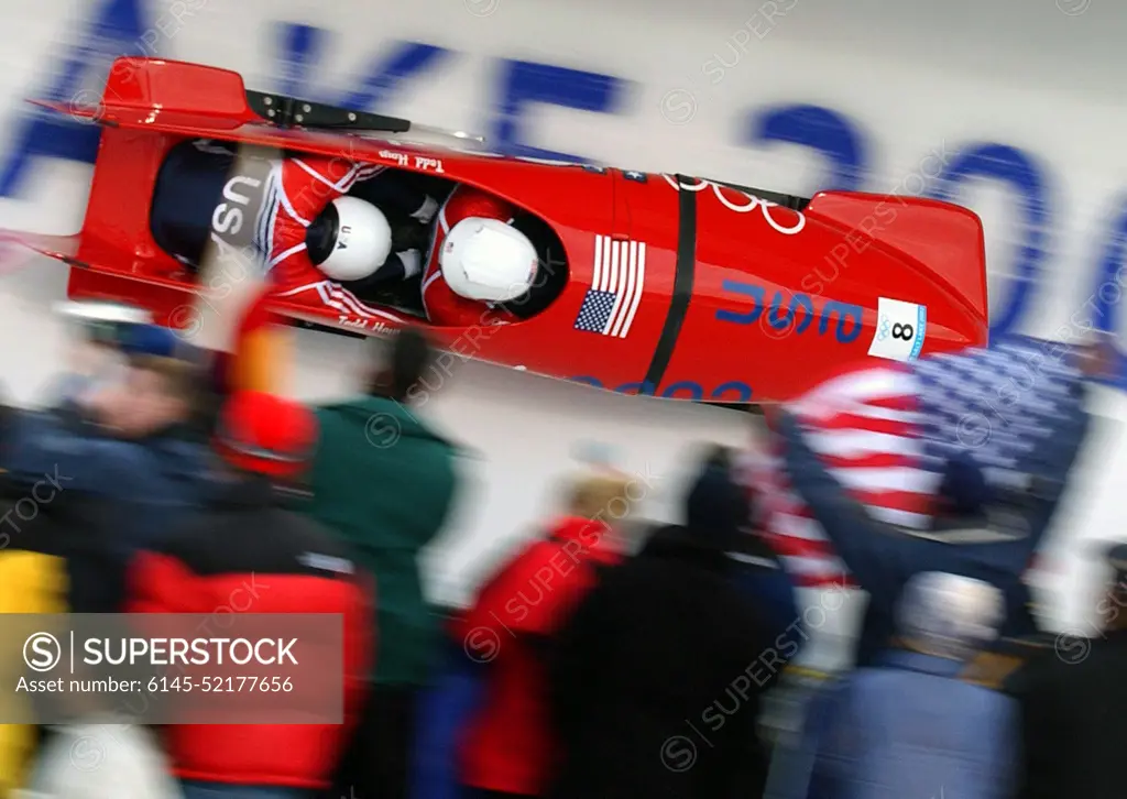 Bobsled Driver Todd Hays and brakeman Army reservist First Lieutenant Garret Hines, USA, of USA-1 hurl their way down the track at the Utah Olympic Park during the Men's two-man bobsled at the 2002 OLYMPIC WINTER GAMES. Subject Operation/Series: 2002 OLYMPIC WINTER GAMES Base: Park City State: Utah (UT) Country: United States Of America (USA)