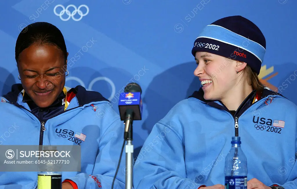 Vonetta Flowers (left) and World Class Athlete SPECIALIST Jill Bakken, USA, laugh at the recent accomplishment moments after winning the gold medal for the United States in first women's two-man bobsled event during the 2002 WINTER OLYMPIC GAMES. The team was not favored going in but ended up breaking a 46 year drought for the United States and winning the Gold over another American team and favored German team, setting a track record in the process. Subject Operation/Series: 2002 WINTER OLYMPIC GAMES Base: Park City State: Utah (UT) Country: United States Of America (USA)