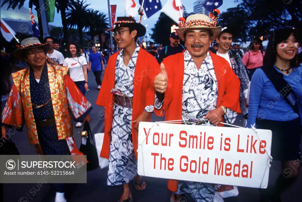 A group of Japanese expatriates, wearing traditional dress, wander through Olympic Park on their way to an evening event. Numerous US Department of Defense personnel are taking part in the Olympics, from coaches and support staff to athletes in various venues. Base: Sydney State: New South Wales Country: Australia (AUS)