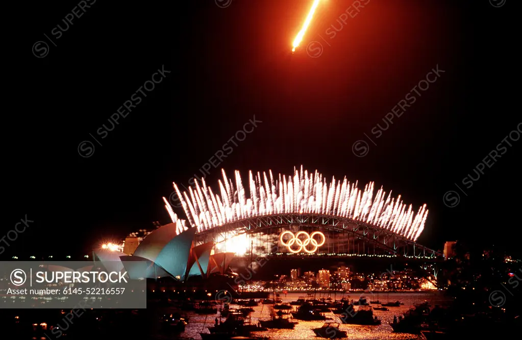 A US Air Force F-111 Aardvark aircraft, with it's after burner on, clears the Sydney Harbour Bridge during closing ceremonies of the 2000 Olympics games in Sydney, Australia. Base: Sydney State: New South Wales Country: Australia (AUS)