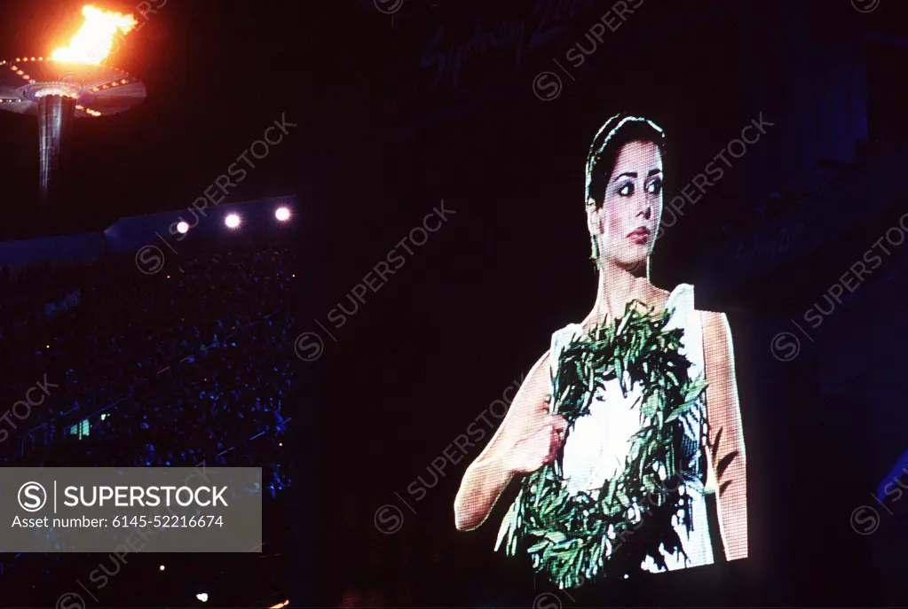 An"Olympic Goddess"is shown on a television screen at Olympic Stadium during closing ceremonies on the last day of the 2000 Olympics in Sydney, Australia. Fifteen US Department of Defense personnel participated in the Olympics, from coaches and support staff to athletes competing in various venues. An "Olympic Goddess" is shown on a television screen at Olympic Stadium during closing ceremonies on the last day of the 2000 Olympics in Sydney, Australia.  Fifteen US Department of Defense personnel participated in the Olympics, from coaches and support staff to athletes competing in various venues.