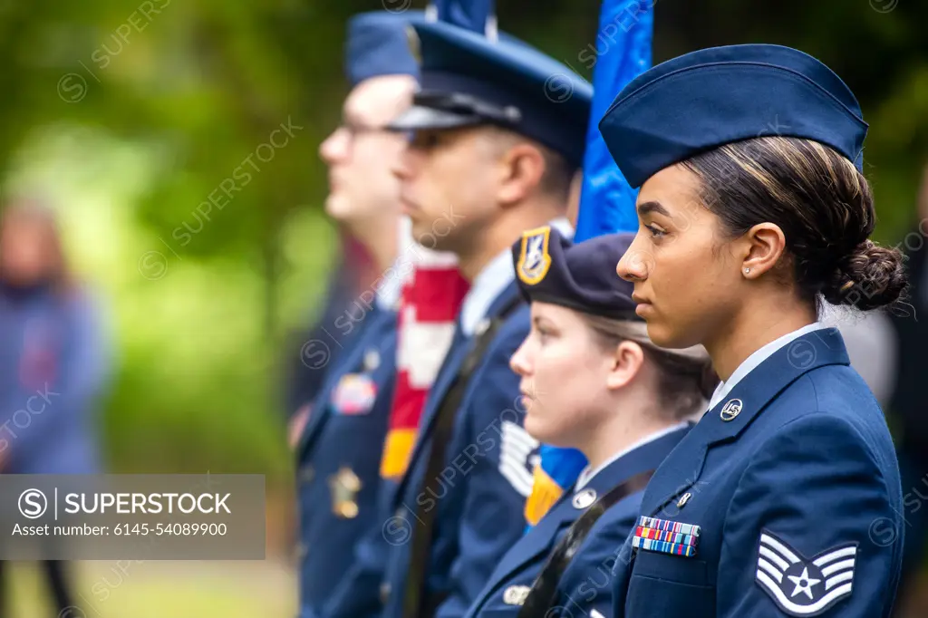 Airmen from the 422d Air Base Group honor guard stand at attention during a Remembrance Day ceremony at RAF Welford, England, Nov. 10, 2022. Airmen from the 501st Combat Support Wing, Royal Air Force, and distinguished guests came together to honor the sacrifices of armed forces veterans, past and present.