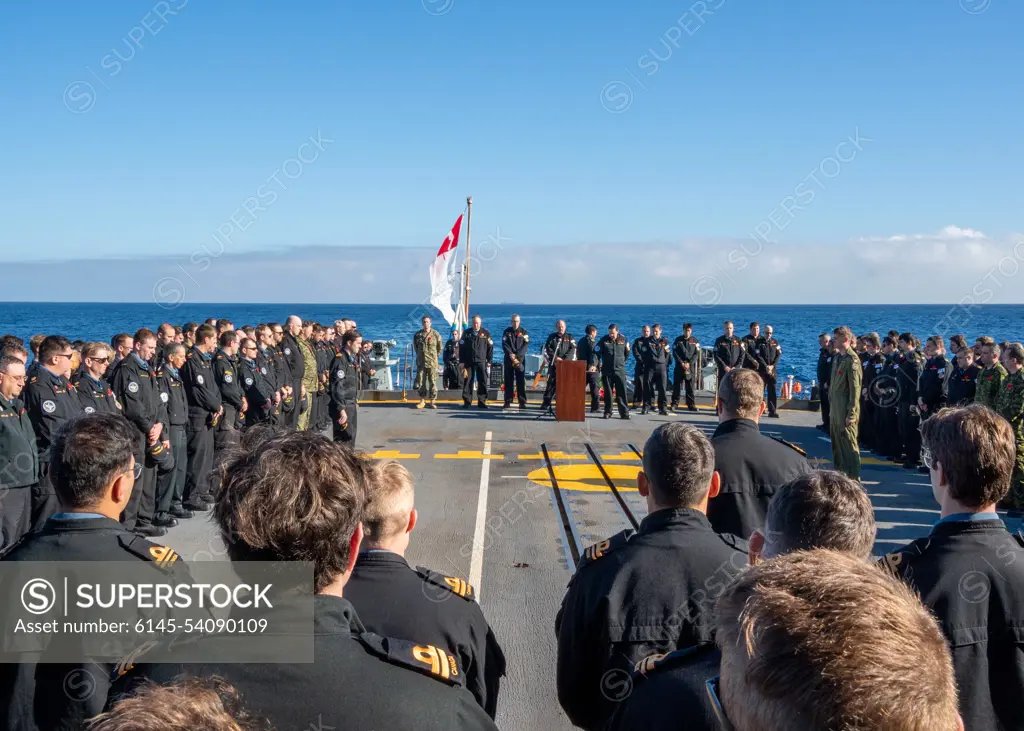 ATLANTIC OCEAN (Nov. 11, 2022) Canadian Rear Adm. David Patchell, vice commander, U.S. 2nd Fleet, attends a Canadian Remembrance Day ceremony on the Halifax-class frigate HMCS Montreal (FFH 336), Nov. 11.  The Montreal is attached to the Gerald R. Ford Carrier Strike Group which is deployed in the Atlantic Ocean, conducting training and operations alongside NATO Allies and partners to enhance integration for future operations and demonstrate the U.S. Navy's commitment to a peaceful, stable and conflict-free Atlantic region.