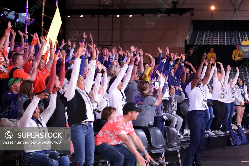 Fans cheer for Team U.S. as they compete in sitting volleyball against Team United Kingdom during the Invictus Games The Hague, Netherlands, April 17, 2022.