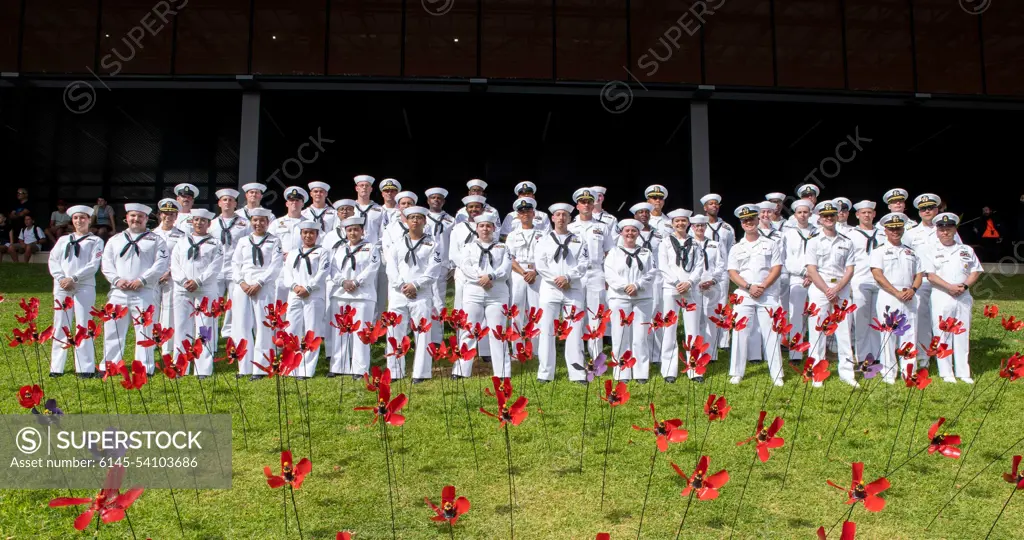 FREMANTLE, Australia (April 25, 2022) - Sailors assigned to the Emory S. Land-class submarine tender USS Frank Cable (AS 40) pose for a group photo following the Anzac Day parade held in Fremantle, Australia, April 25, 2022. Anzac Day is a day of remembrance for all Australian and New Zealand service members who gave the ultimate sacrifice in service to their country. Frank Cable is currently on patrol conducting expeditionary maintenance and logistics in support of national security in the U.S. 7th Fleet area of operations.