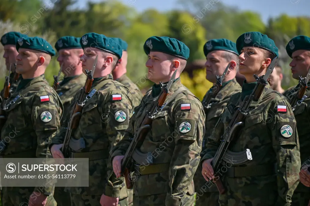 Polish soldiers stand in formation during a Victory Day remembrance ceremony at Drawsko Pomorskie, Poland, May 8, 2022. Victory Day, or V - E Day in the United States, recognizes the end of World War II in the European theater, and remembers the sacrifices of service members and civilians lost during the conflict.