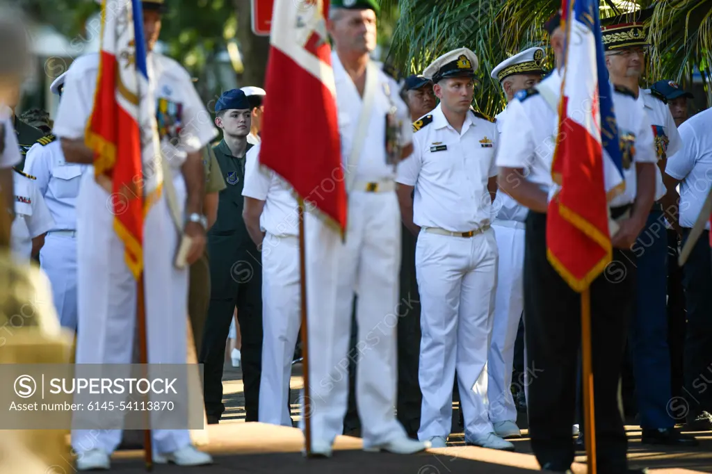 Participants stand at-ease during a Victory in Europe Day World War II remembrance ceremony outside the Haut-commissariat de la République Tahiti, French Polynesia, May 8, 2022. Exercise Marara 22 reinforces U.S. commitments to our allies and partners in Oceania and raises our collective readiness to address crises and contingencies in the region.